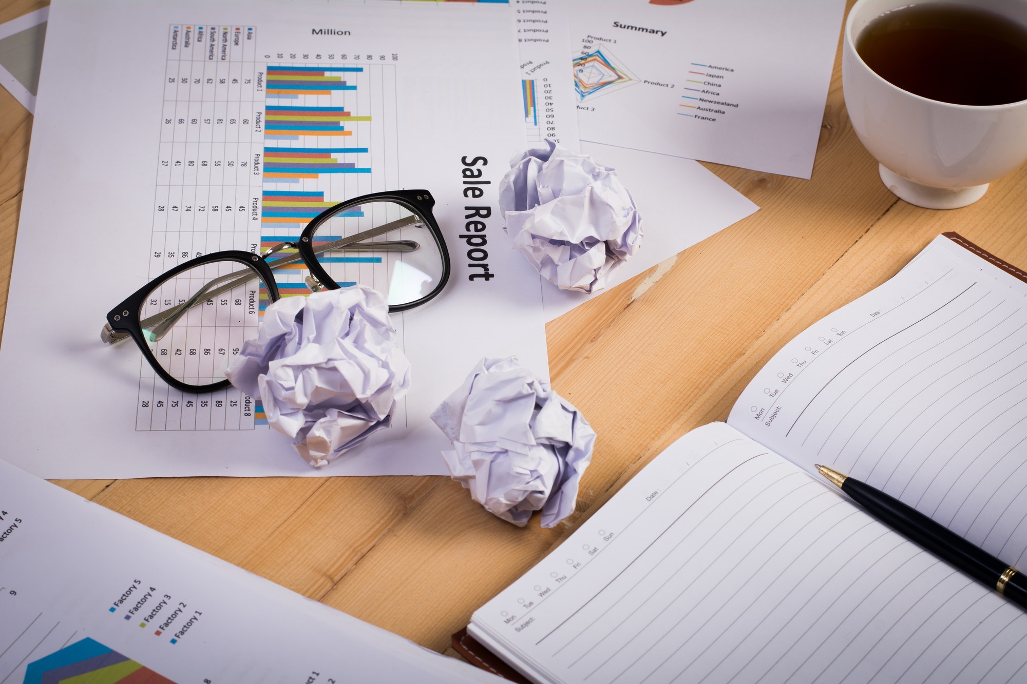 business-workplace-with-paper-chart-graph-and-money-business-finance-concept-.jpg